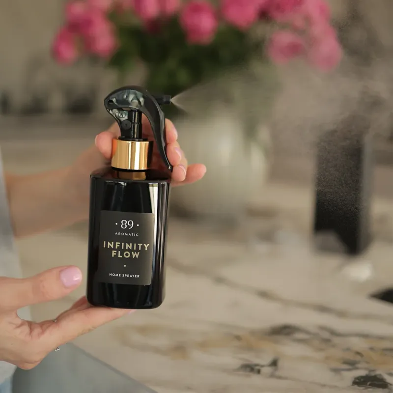 How does the aroma of a sprayed home fragrance unfold?