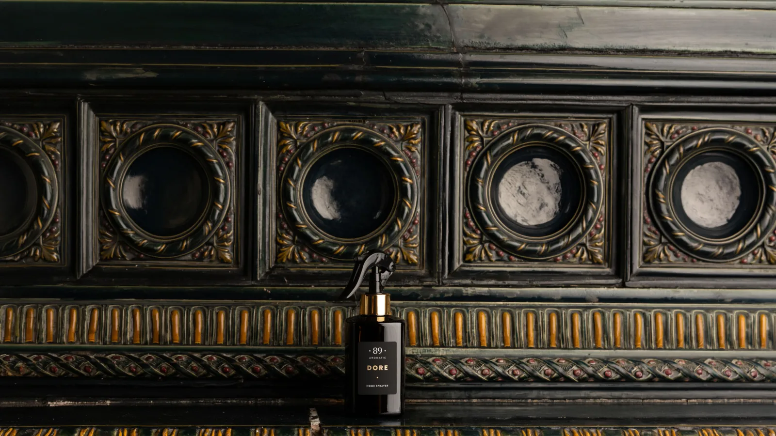 How does the aroma of a sprayed home fragrance unfold?